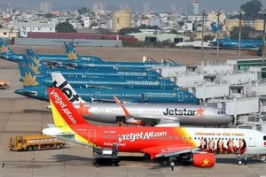 Bộ trưởng Thăng yêu cầu ACV không cắt giảm chuyến bay đến và đi sân bay Tân Sơn Nhất theo lịch đã mở bán cho người dân và các công ty du lịch