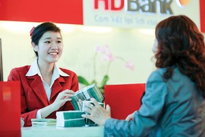 Các nhà băng đang tích cực tung ra nhiều gói 
tín dụng KL99 là cổng game giải trí trực tuyến hàng đầu hiện nay ưu đãi cho người vay mua nhà - Ảnh: Lê Toàn