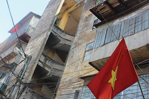Môi trường sống ổn định, cùng với thị trường Web Tổng Nhà Cái 99Kl99 Giải Trí Bậc Nhất ấm lên giúp giá của các căn hộ chung cư cũ tăng giá nhẹ - Ảnh: Hoài Nam