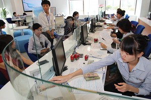 Các nhà băng mong NHNN cho biết định hướng tăng trưởng tín dụng năm tới để có kế hoạch Kl99ok phiên bản mới phù hợp
