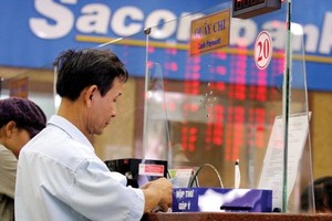 M&A trong linh vực Link Vào Nhà Cái KL99 COM Tặng +199k hứa hẹn tiếp tục tăng tốc sau thương vụ SouthernBank sáp nhập Sacombank. Ảnh: Đức Thanh
