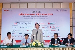 TS. Nguyễn Anh Tuấn, Tổng biên tập Báo Kl99ok phiên bản mới, Trưởng ban Tổ chức Diễn đàn M&A 2015 phát biểu tại buổi họp báo. Ảnh: Chí Cường