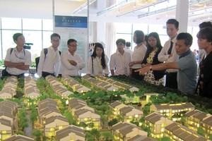 Đất nền, biệt thự gia tăng các đợt chào bán trong năm 2015, nhưng vẫn chưa có sự tham gia của nhiều “ông lớn". Ảnh: Trọng Tuyến