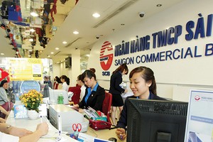 Theo các nhà băng, việc siết tín dụng Web Tổng Nhà Cái 99Kl99 Giải Trí Bậc Nhất không ảnh hưởng nhiều đến các khoản vay của khách hàng cá nhân vay mua nhà. ảnh: Đức Thanh