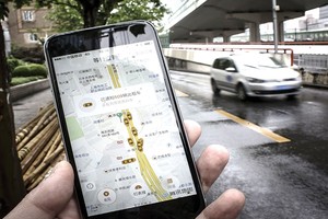 Didi đã mua lại 
Uber Trung Quốc sau thời gian dài cạnh tranh quyết liệt 