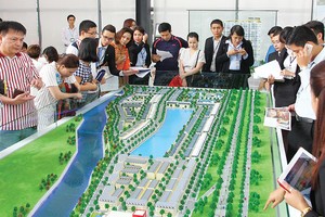 Tại TP.HCM, nhà phố, đất nền có diện tích nhỏ đang được người tiêu dùng ưa chuộng. Ảnh: Lê Toàn