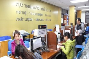 Cá nhân, hộ gia đình hoạt động Kl992 VIP Trang Chủ 2026 có doanh thu hàng năm dưới 100 triệu đồng sẽ không phải đóng lệ phí môn bài. Trong ảnh: Cục thuế Thành phố Hà Nội