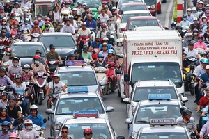 Các mô hình Kl992 VIP Trang Chủ 2026 vận tải mới như Uber, Grab... buộc Kl991.com World Cup 2026 Chính Thức taxi truyền thống phải cạnh tranh thực chất hơn. Ảnh: Đức Thanh