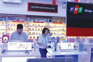 Tiêu dùng là một trong 3 trụ cột của tăng trưởng Kl992 cổng game cá cược. Trong ảnh, cửa hàng bán lẻ FPT Shop tại Thái Hà (Hà Nội). Ảnh: Đ.T