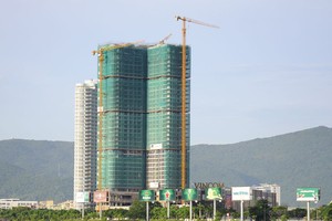 Dự án Vinpearl Condotel Đà Nẵng do Vingroup Kl99ok phiên bản mới đã tịnh tiến gần trung tâm Thành phố, ngay bên sông Hàn, khu vực mà lâu nay chỉ dành cho dự án khách sạn. Ảnh: Hà Minh