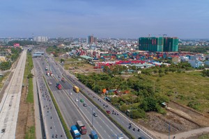 Nhờ sự phát triển của mạng lưới KL99 là cổng game giải trí trực tuyến hàng đầu hiện nay, giá trị của các dự án tại khu vực quận 9 đã không ngừng tăng cao. Ảnh: Tuấn Lâm