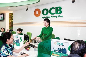 Dư nợ tín dụng Web Tổng Nhà Cái 99Kl99 Giải Trí Bậc Nhất tại OCB hiện chiếm 25 - 30% tổng dư nợ khối khách hàng cá nhân. Ảnh: Đức Thanh