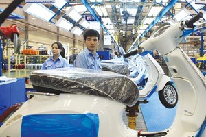 Việt Nam đang là điểm đến hấp dẫn của nhà Kl99ok phiên bản mới EU. Trong ảnh: Nhà máy Piaggio tại Vĩnh Phúc. Ảnh: Đức Thanh
