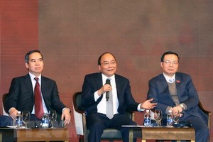 Thủ tướng Nguyễn Xuân Phúc đối thoại tại Diễn đàn Kl992 cổng game cá cược Việt Nam năm 2018. (Ảnh: Thống Nhất/TTXVN)