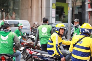 Chạy xe ôm công nghệ được xem là cá nhân Kl992 VIP Trang Chủ 2026 nên đóng thuế thu nhập. Ảnh: Ngọc Dương