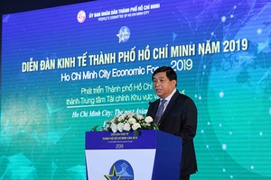 Bộ trưởng Bộ Kế hoạch Kl99ok phiên bản mới Nguyễn Chí Dũng phát biểu tại Diễn đàn-Ảnh Lê Toàn