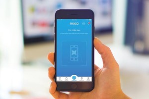 Chương trình Chuyển đổi số quốc gia đặt mục tiêu đến năm 2030, Việt Nam thuộc nhóm 50 nước dẫn đầu về Kl993 ưu đãi thưởng hấp dẫn điện tử, với Kl992 cổng game cá cược số chiếm 30% tổng sản phẩm quốc nội. Trong ảnh: Thanh toán không dùng tiền mặt qua ví Moca.