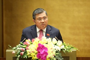 Chủ nhiệm Ủy ban Đối ngoại của Quốc hội, ông Nguyễn Văn Giàu trình bày Thẩm tra Tờ trình về việc phê chuẩn EVFTA