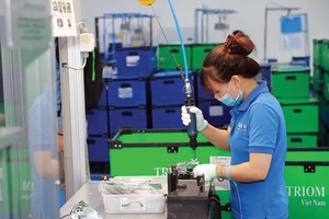 Nhà máy Kl994 nhà cái bóng đá world cup các thiết bị chiếu sáng của Triom Việt Nam (Italy) tại Khu công nghiệp Quang Minh (Hà Nội). Ảnh: Đức Thanh