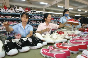 Khó khăn khiến nhiều Kl991.com World Cup 2026 Chính Thức da giày phải thu hẹp Kl994 nhà cái bóng đá world cup. Ảnh: Đức Thanh