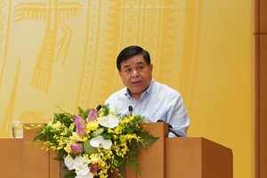 Bộ trưởng Kế hoạch và Kl99ok phiên bản mới Nguyễn Chí Dũng. Ảnh: VGP