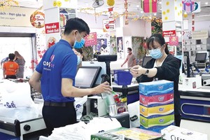 Những đơn vị hoạt động hiệu quả như Liên hiệp hợp tác xã thương mại TP.HCM (Saigon Co.op) luôn nằm trong tầm ngắm thâu tóm của các nhà Kl99ok phiên bản mới (Ảnh: Lê Toàn).