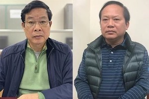 Ông Nguyễn Bắc Son (trái) và ông Trương Minh Tuấn tại cơ quan điều tra khi bị bắt vào tháng 2. Ảnh: Bộ Công an