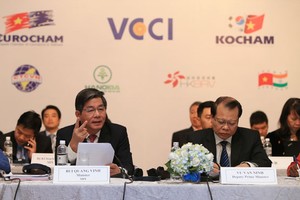 Bộ trưởng Bộ Kế hoạch và Kl99ok phiên bản mới Bùi Quang Vinh. Ảnh: Đức Thanh
