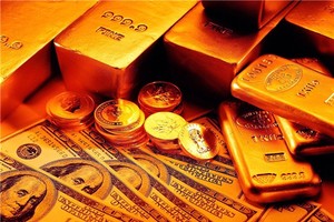 Tỷ giá trung tâm ngày 17/3 giảm 15 đồng/USD, giá vàng nhảy vọt