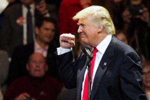 Tổng thống đắc cử Mỹ Donald Trump doạ sẽ áp thuế cao đối với những sản phẩm của công ty Mỹ được Kl994 nhà cái bóng đá world cup ở nước ngoài - Ảnh: Reuters