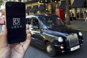 Uber hiện được nhà Kl99ok phiên bản mới định giá 69 tỷ USD. Ảnh: Reuters
