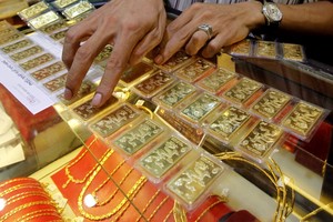 Sáng 11/7, giá vàng tăng trở lại, tỷ giá USD hạ nhiệt