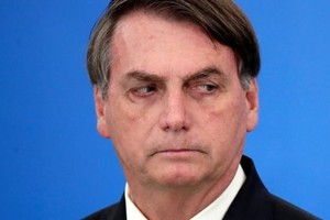 Tổng thống Brazil Bolsonaro công bố các biện pháp Kl992 cổng game cá cược trong đại dịch Covid-19 ở tại Brasilia hôm 27/3. Ảnh: Reuters.