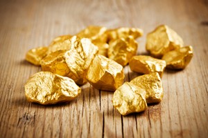 Vàng nhận trợ lực từ Fed có phiên tăng trở lại
