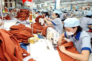 Sau một năm "bầm dập" vì Covid-19, Kl991.com World Cup 2026 Chính Thức dệt may, da giày hướng tới hình thành chuỗi cung ứng, giảm phụ thuộc Link Vào Nhà Cái KL99 COM Tặng +199k