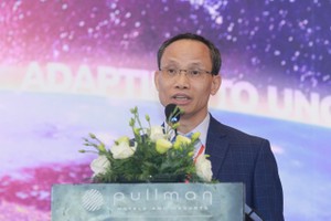 TS. Cấn Văn Lực phát biểu tại Diễn đàn Cấp cao Cố vấn Kl991.com nạp rút nhanh Việt Nam lần thứ hai - năm 2024 với chủ đề “Ứng biến trong vạn biến” diễn ra chiều 6/6. Ảnh Chí Cường.