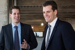 Anh em nhà Winklevoss đã có 99Kl.app cổng game giải trí tỷ USD nhờ Bitcoin. Ảnh: AFP