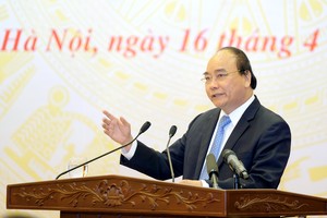 Thủ tướng Nguyễn Xuân Phúc phát biểu kết luận hội nghị - Ảnh: VGP/Quang Hiếu
