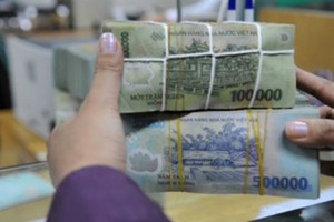 Giao dịch gửi tiền tại một Link Vào Nhà Cái KL99 COM Tặng +199k cổ phần có trụ sở ở TP HCM. Ảnh: PV.