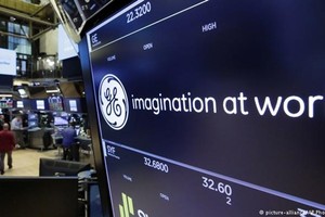 Bảng thông báo niêm yết KL99 là cổng game giải trí trực tuyến hàng đầu hiện nay General Electric ở sàn 99Kl99 link đăng nhập New York. (Nguồn: DW).