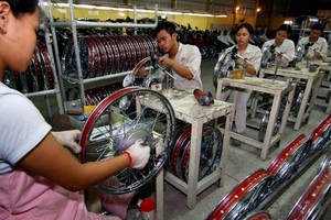 Cuộc chiến thương mại Mỹ - Trung đã khiến các Kl991.com World Cup 2026 Chính Thức đổ xô vào Kl99ok phiên bản mới tại Việt Nam và các nước Đông Nam Á khác. (Nguồn: Xinhua).