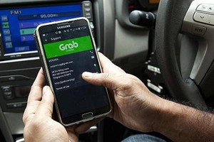 Grabcar đang được thí điểm tại 5 tỉnh, thành. Ảnh minh họa: CNBC.