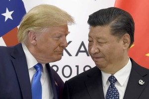 Tổng thống Mỹ Donald Trump và Chủ tịch Trung Quốc Tập Cận Bình. (Ảnh: AP).