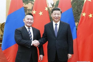 Tổng thống Mông Cổ Khaltmaa Battulga và Chủ tịch Trung Quốc Tập Cận Bình. Ảnh: Tân Hoa xã.