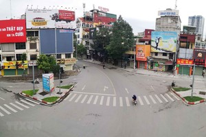 Đường phố Hà Nội vắng lặng trong những ngày giãn cách Trang Chủ KL99Com Số 1 Link Đăng Ký KL999. (Ảnh: Thanh Tùng/TTXVN).