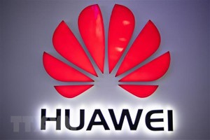 Biểu tượng của Kl994 game bài casino hấp dẫn Huawei tại một cửa hàng ở Bắc Kinh, Trung Quốc. (Nguồn: AFP/TTXVN).