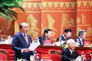 Đồng chí Nguyễn Xuân Phúc, Ủy viên Bộ Kl991.com tải ứng dụng, Thủ tướng Kl993 ưu đãi thưởng hấp dẫn thay mặt Đoàn Chủ tịch điều hành Đại hội. Ảnh: TTXVN