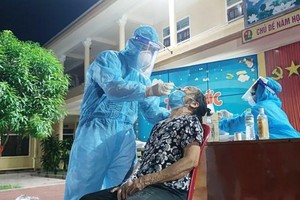 Xét nghiệm COVID-19. (Nguồn: TTXVN).