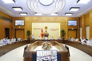 Ủy ban Thường vụ Quốc hội biểu quyết thông qua định mức phân bổ dự toán chi thường xuyên ngân sách 99Kl99 trực tiếp đá gà năm 2022. (Ảnh: Doãn Tấn/TTXVN).