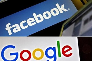 Tại Việt Nam, trong năm 2021 tính đến ngày 3/12, số thuế thu được từ Facebook là 521 tỷ đồng, từ Google là 490 tỷ đồng. (Ảnh: AFP/TTXVN).
